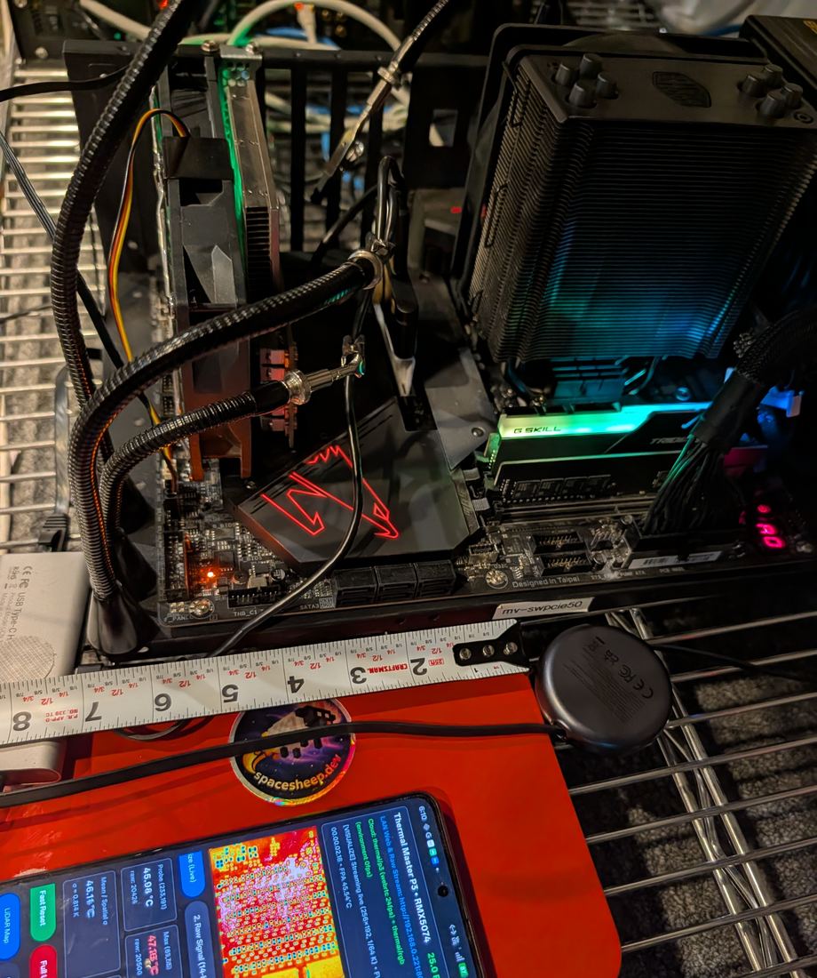 The same install from the side, a measure laid across the machine